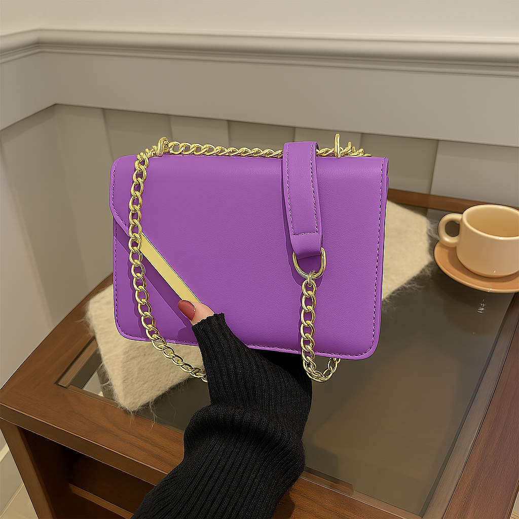 Elegant Black Leather Shoulder Bag with Gold Chain