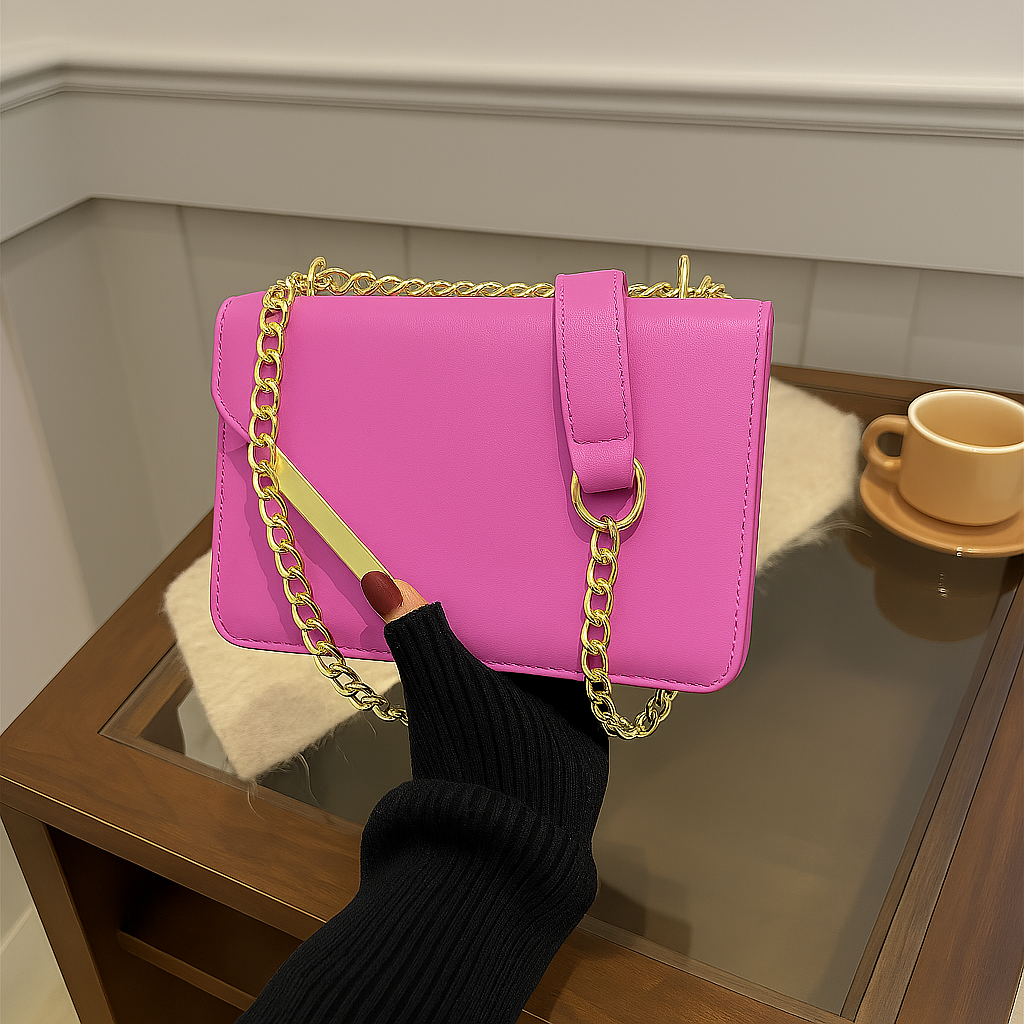 Elegant Black Leather Shoulder Bag with Gold Chain