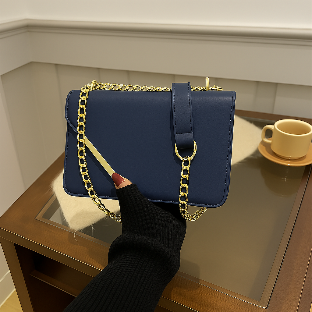 Elegant Black Leather Shoulder Bag with Gold Chain